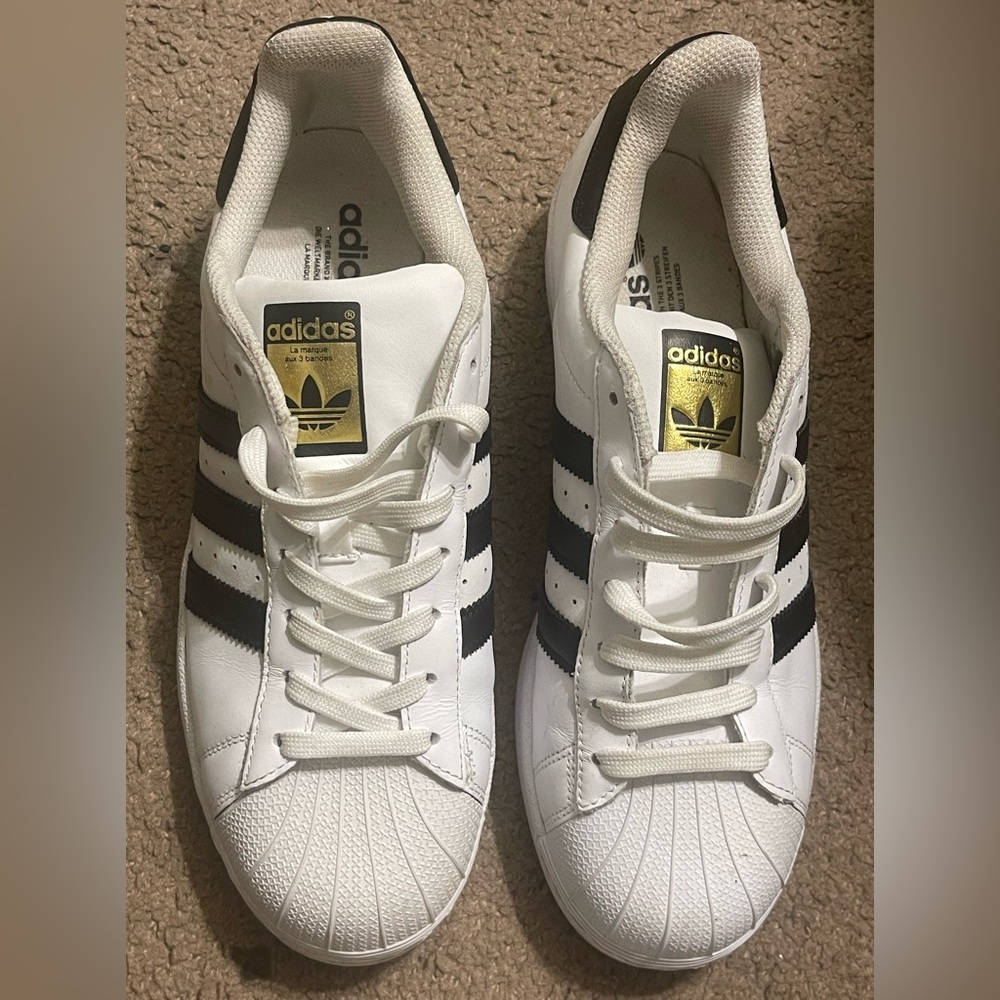 White and gold men’s adidas 8 1/2
